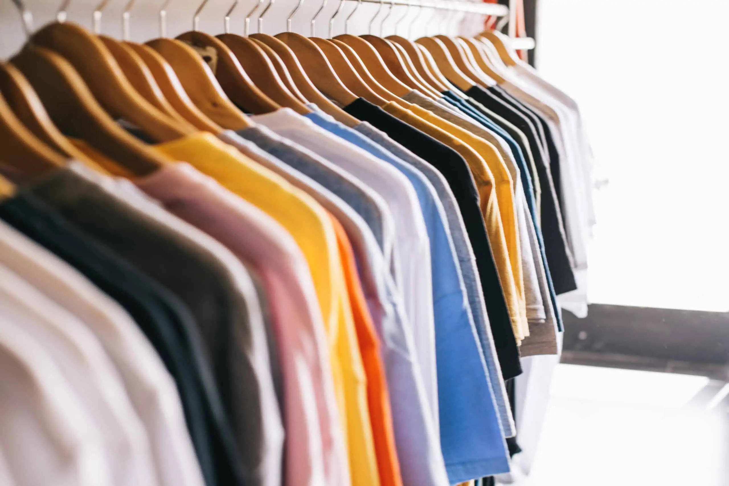 clothes rail with t shirts scaled